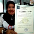Kartini, Sekdin Indag Magetan, Menunjukan SK UTTP. ( Norik/Magetan Today)